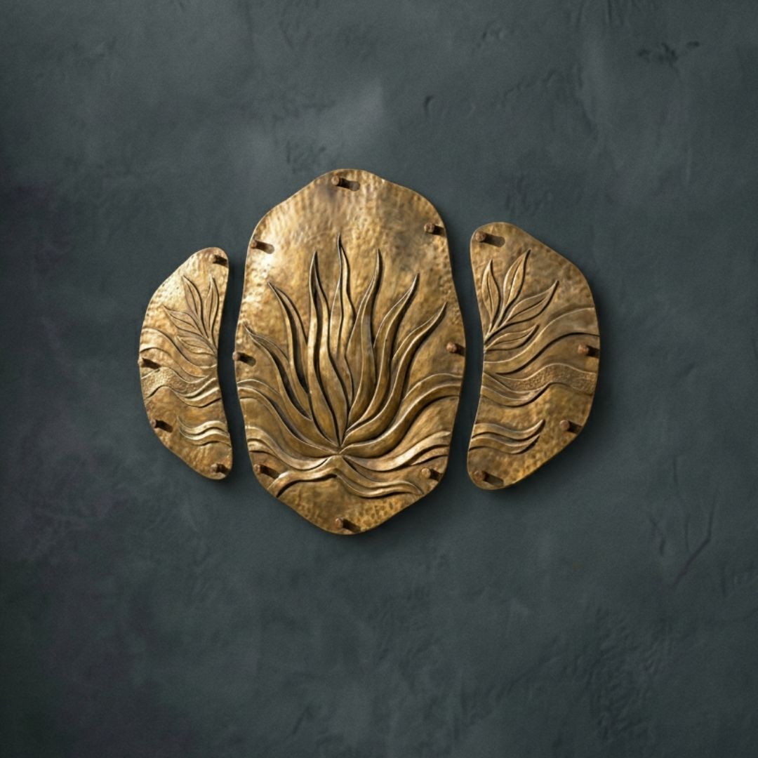 Hand-refined 18-gauge solid brass wall accents featuring organic textures and a living finish.